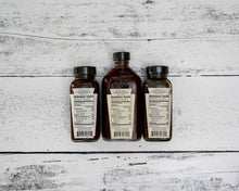 Load image into Gallery viewer, Woodberry Kitchen Snake Oil Hot Sauce 6oz