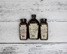 Load image into Gallery viewer, Woodberry Kitchen Snake Oil Hot Sauce 6oz